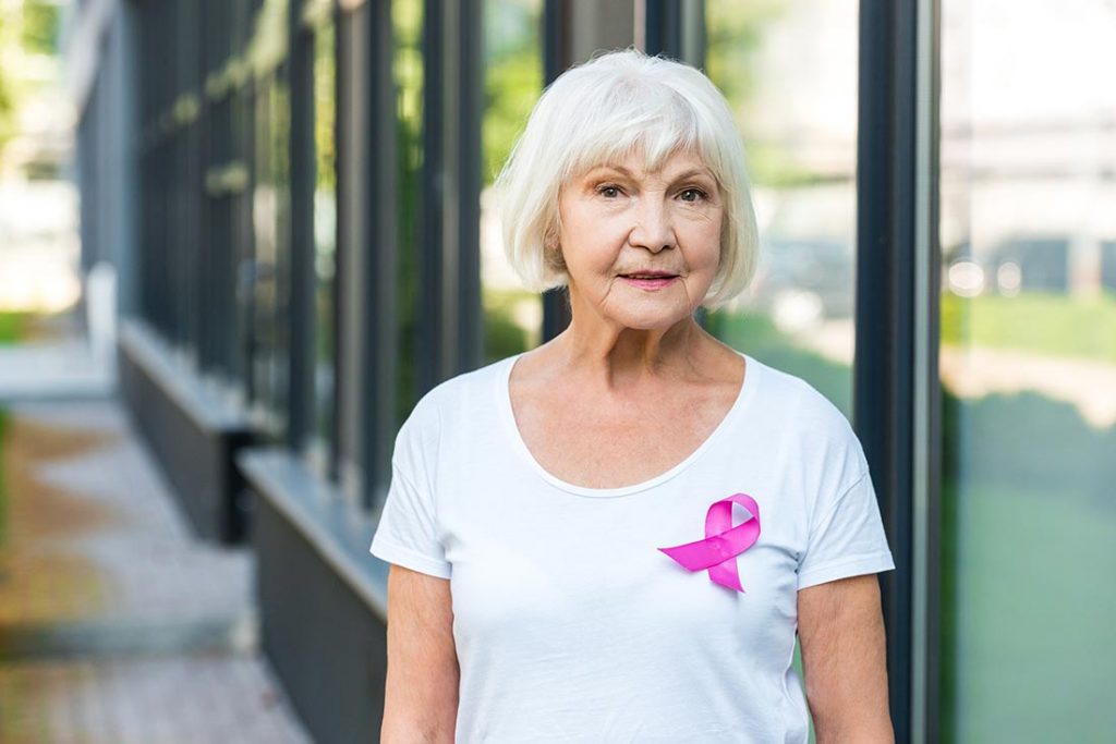 senior woman supporting breast cancer